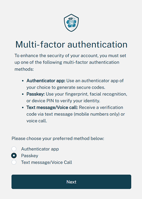 Multi-factor authentication registration screen displaying options for an authenticator app, passkey, or text message/voice call, where the passkey is selected